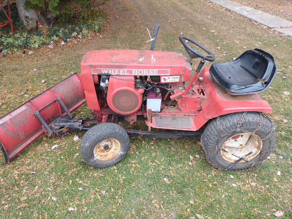 1974 C-160 8 spd w/ plow and chains - Wheel Horse Sold Archive ...